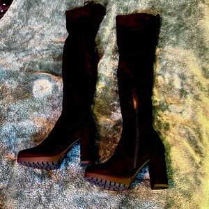 Never worn tall black boot slip on over the knee with original box size 6